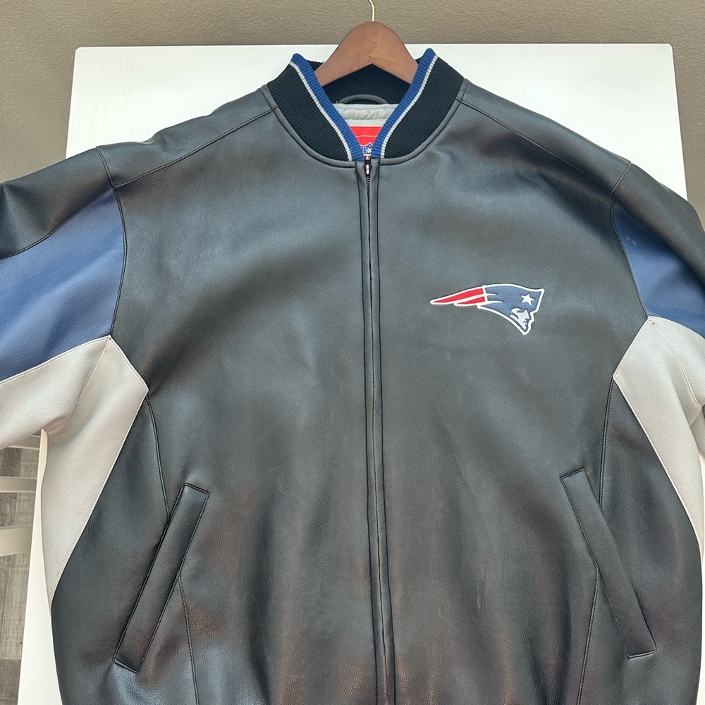 Sold on another platform —NFL Black and Blue Bomber Jacket with Patriots Logo